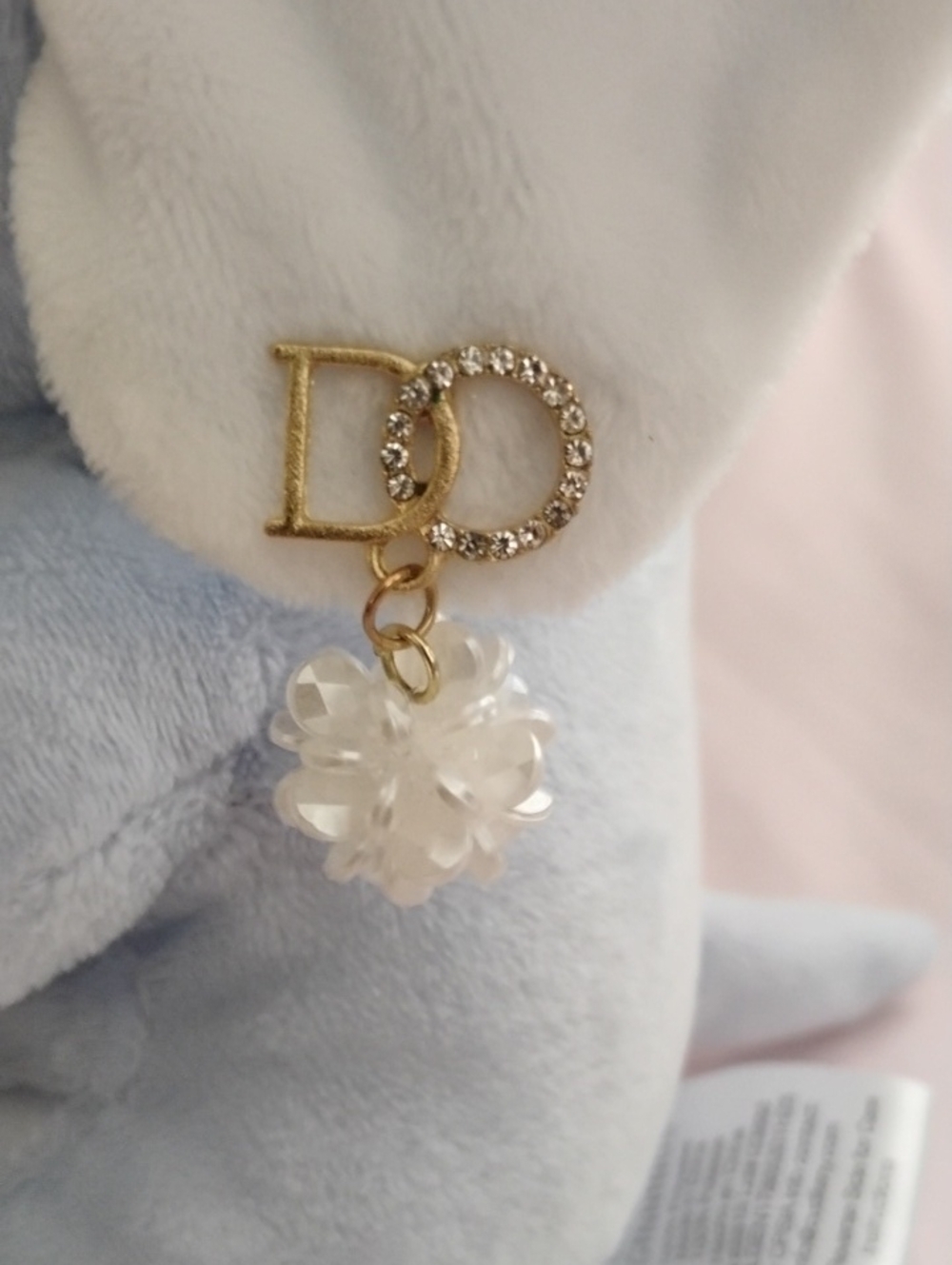 Gold DD Crystal Charm Plush Earring Detail